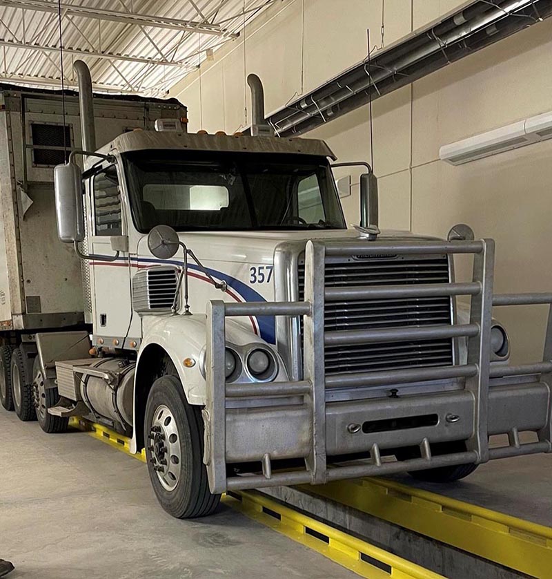 Weather is not an issue when inspecting trucks in the indoor bay.